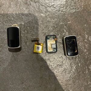 Fitbit Black and Silver Watch Components